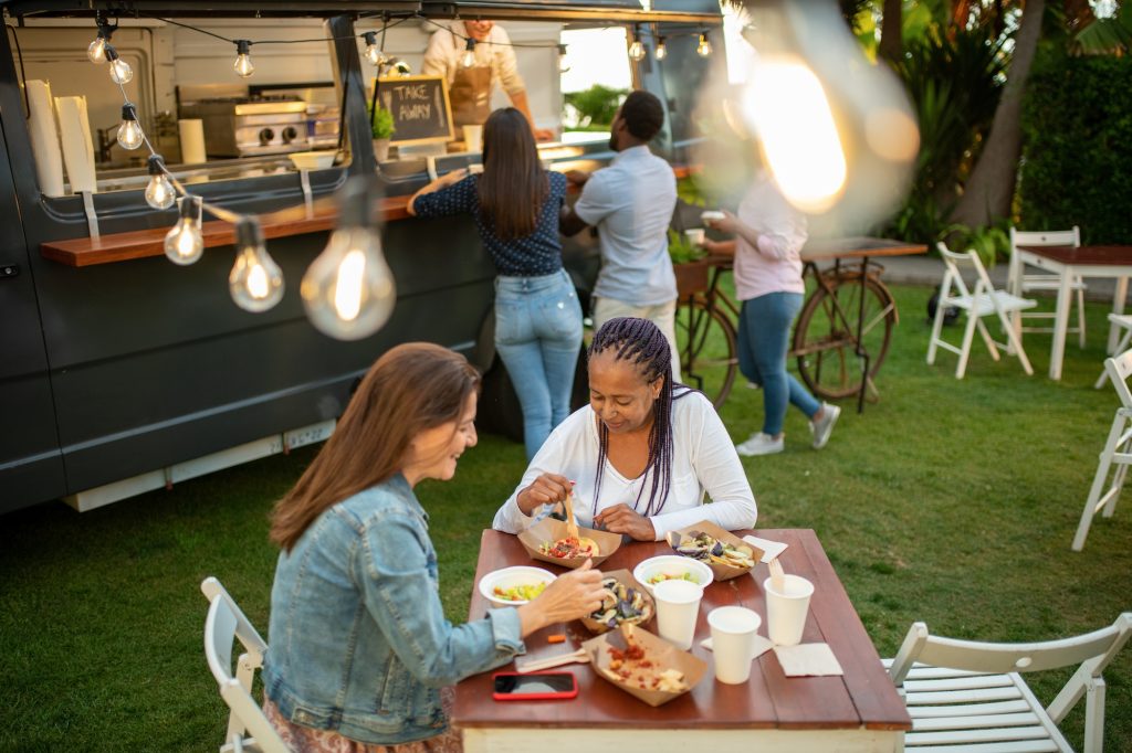 Group of friends having picnic